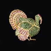 A ruby and emerald turkey brooch
