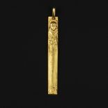 A gold coloured St. Francis of Assisi pendant