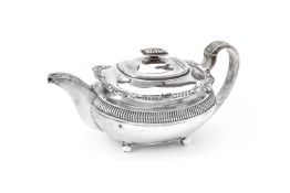 ϒ A late George III silver oblong baluster tea pot