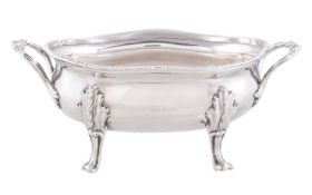 A George III silver oval sauce tureen with cover lacking by Thomas Harper I