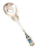 An Arts and Crafts silver and enamel spoon by William Hutton & Sons