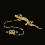 A late Victorian demantoid garnet and seed pearl lizard brooch