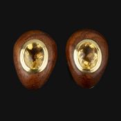 A pair of citrine and wood ear clips