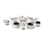 A collection of silver cruet items