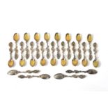 Twenty-one Victorian silver gilt cast tea spoons by Francis Higgins III