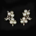 A pair of cultured pearl and diamond earrings