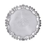 An Irish silver shaped circular salver perhaps William Williamson