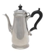 An American silver coloured straight-tapered coffee pot by Tiffany & Co.