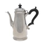 An American silver coloured straight-tapered coffee pot by Tiffany & Co.