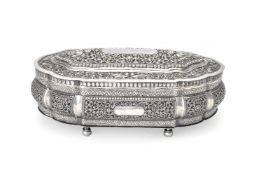 An Indian silver coloured shaped oblong box and cover