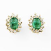A pair of emerald and diamond cluster ear studs
