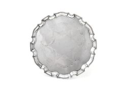 A silver shaped circular salver