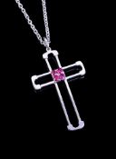 A ruby cross pendant