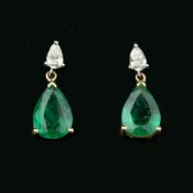 A pair of emerald and diamond earrings