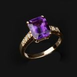 An amethyst and diamond ring