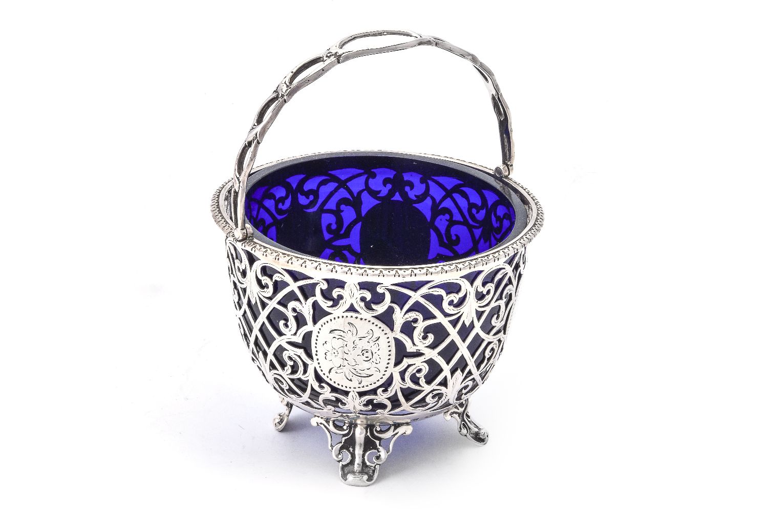 A Victorian silver circular sugar basket by George John Richards & Edward Charles Brown