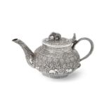 An Indian silver compressed spherical tea pot