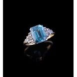 A blue zircon and diamond ring