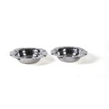 A pair of Edwardian silver octolobed bowls by Atkin Brothers