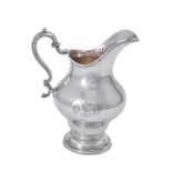 An American silver coloured ogee baluster water jug by Gorham Manufacturing Co.