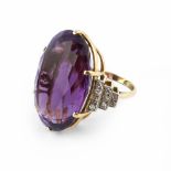 An amethyst and diamond dress ring