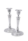 A matched pair of silver oval candlesticks by Fordham & Fordham