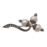 A cultured pearl and diamond brooch