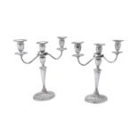 A pair of electro-plated oval candelabra