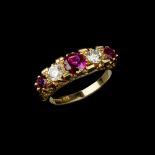 An 18 carat gold ruby and diamond five stone ring