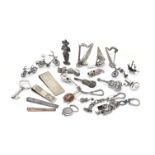 A collection of small silver coloured, white alloy and plated objects