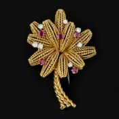 A 1960s abstract ruby and diamond flower brooch