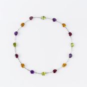 A multi gem set necklace