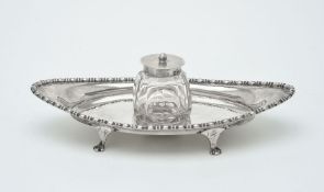 A silver oval inkstand by James Deakin & Sons