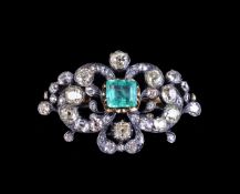 A mid Victorian yellow diamond, diamond and emerald brooch