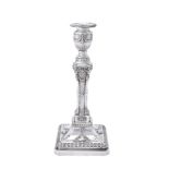 A silver canted-square columnar candlestick by Barker Ellis Silver Co.