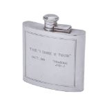 A silver curved rectangular spirit flask by Tiffany and Co.