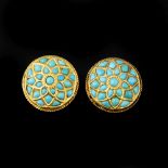 A pair of late 19th century Indian turquoise circular brooches