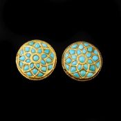 A pair of late 19th century Indian turquoise circular brooches