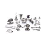 A collection of small silver coloured items