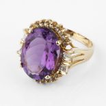 An amethyst and diamond cluster dress ring