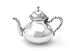 An Italian silver coloured baluster tea pot