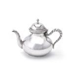 An Italian silver coloured baluster tea pot