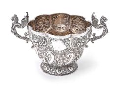 A late Victorian silver multi lobed twin handled bowl by Wakely & Wheeler