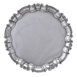 A silver shaped circular salver by William Hutton & Sons