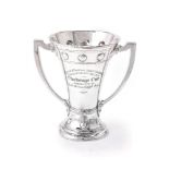 A silver twin handled flared trophy cup by Edward Barnard & Sons Ltd