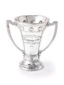 A silver twin handled flared trophy cup by Edward Barnard & Sons Ltd