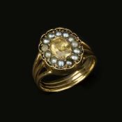 A topaz and pearl cluster ring