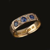 An early 20th century 15 carat gold sapphire and diamond ring