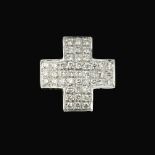 A diamond cross pendant