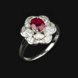 A ruby and diamond flower head cluster ring